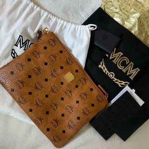 MCM- Authentic Wristlet Zip Pouch in Visetos Original, lightly used.